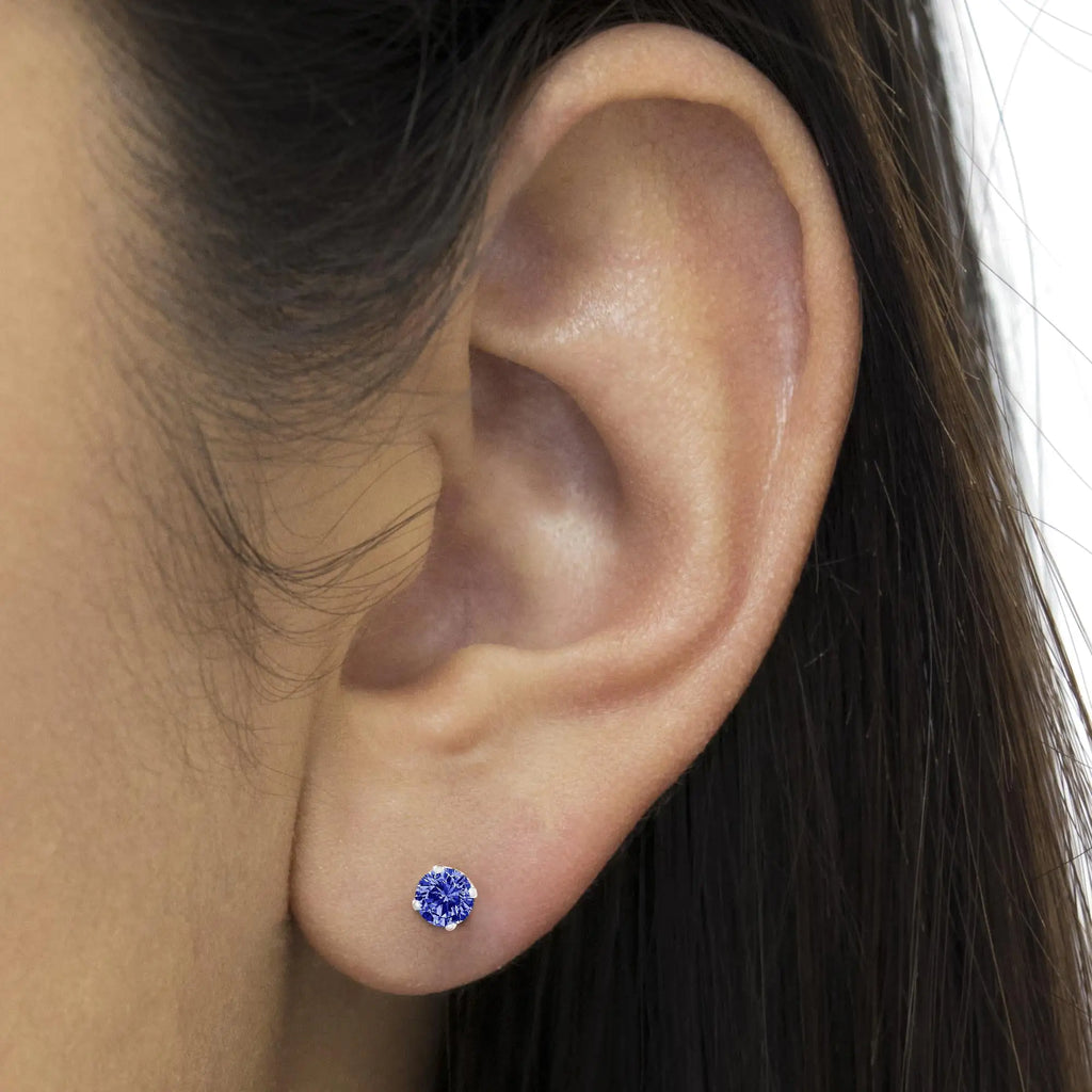 Aros clásicos de 4 puntas con diamantes azules de talla brillante de 1/5 ct en plata esterlina 925 (color elegante mejorado, claridad I2-I3)