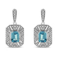 Boucles d'oreilles pendantes et pendantes de style Art déco en argent sterling 925 avec topaze bleue en forme d'émeraude et accents de diamants de 7 x 5 mm (couleur IJ, clarté I1-I2)