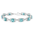 Bracelet de tennis tendance en argent sterling 925 avec topaze bleue taille coussin 7 x 7 mm et diamant taille ronde 1/20 ct (couleur IJ, pureté I1-I2) - 7"