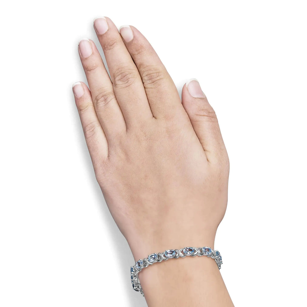 Pulsera de tenis con eslabones en forma de X y topacio azul ovalado de 16,0 quilates y detalles de diamantes en plata de ley 925 (color IJ, claridad I1-I2) - Tamaño 7"